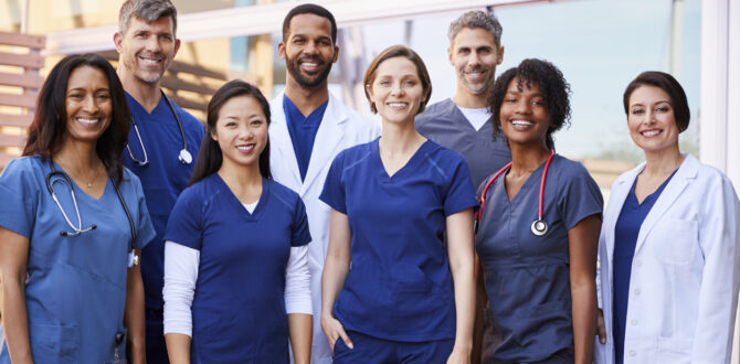 Smiling medical team outside of hospital