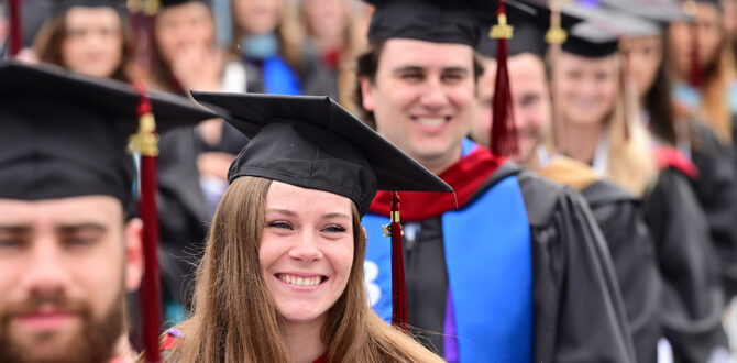 Student similing at High Point University graduation.